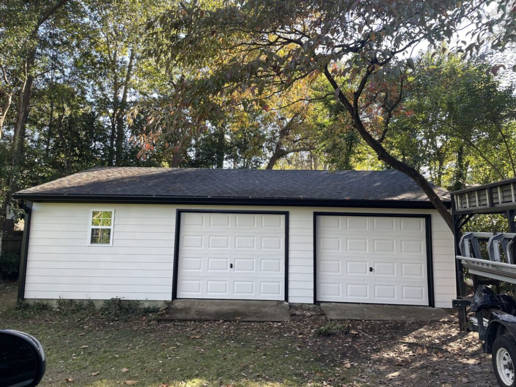 home siding contractors near me Dennis Home Improvement finish a garage remodel on a detached garage building