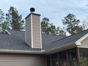 Beautiful new roof  in Chapin, SC 29036, great work around the chimney in this roof replacement project with general contractor near me Dennis Home Improvement