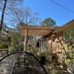 View of Roof going up in this Screen Porch Build in Columbia, SC 29204 with general contractor near me Dennis Home Improvement.