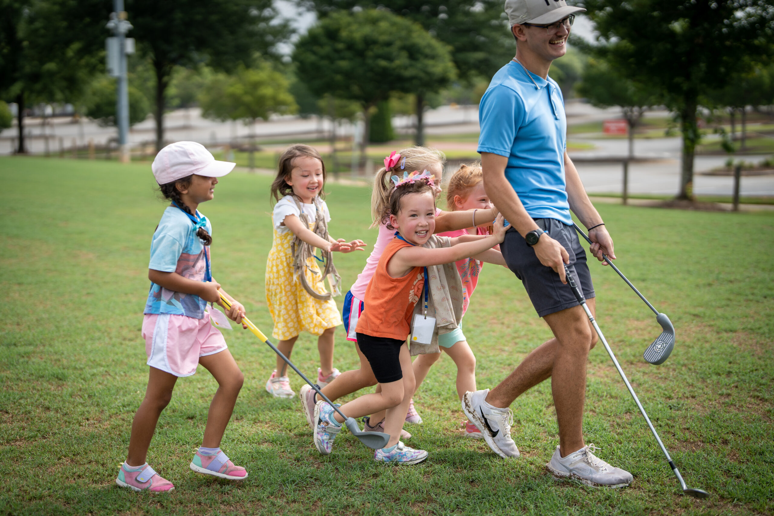 Kids at G1 Golf stations