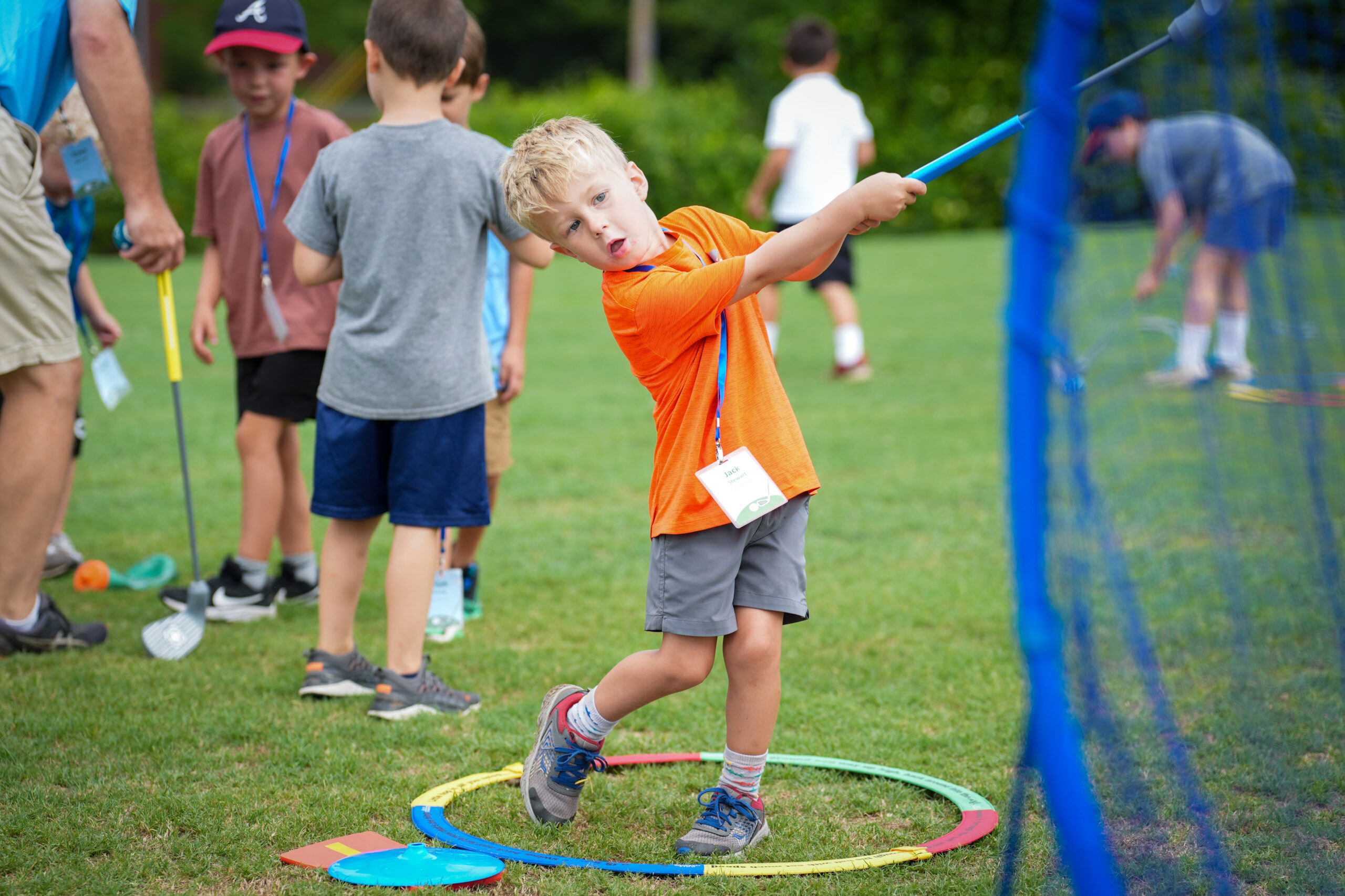 Children participating in a games-based golf learning activity