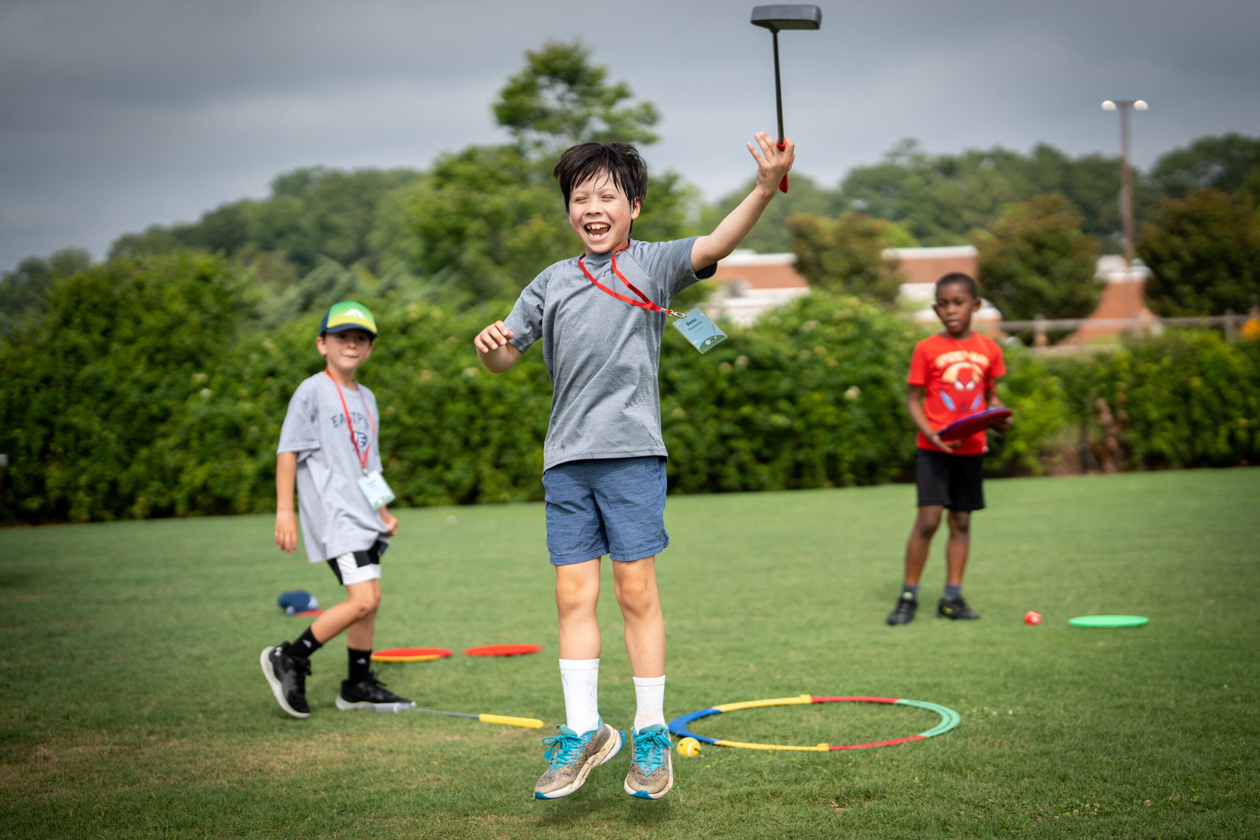 Kids at a G1 Golf outdoor station